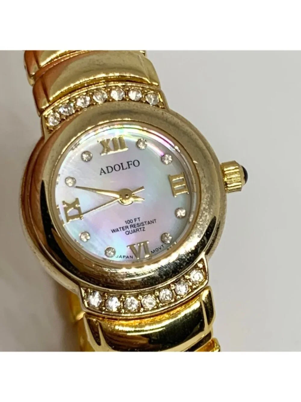 Adolfo women’s gold tone watch quartz mop dial rhinestones 22mm 6.5” running